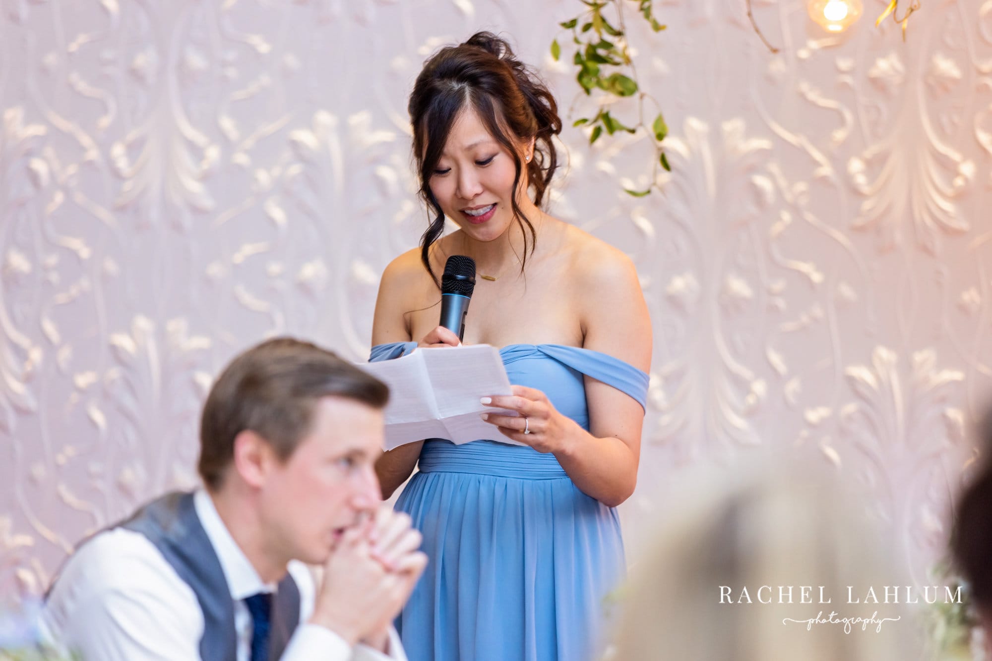 Bridesmaid gives speech during wedding reception at The Blaisdell in Minneapolis.