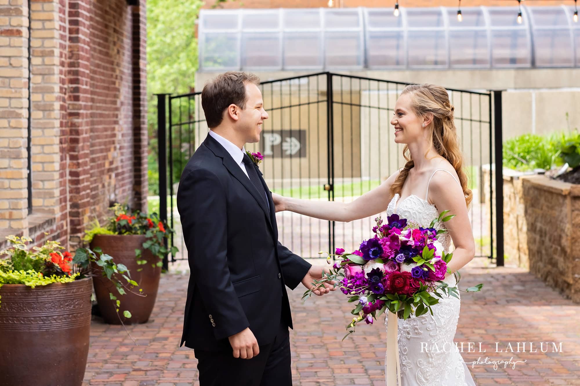 Bride and groom share a first look inside the courtyard at The Minneapolis Event Center.