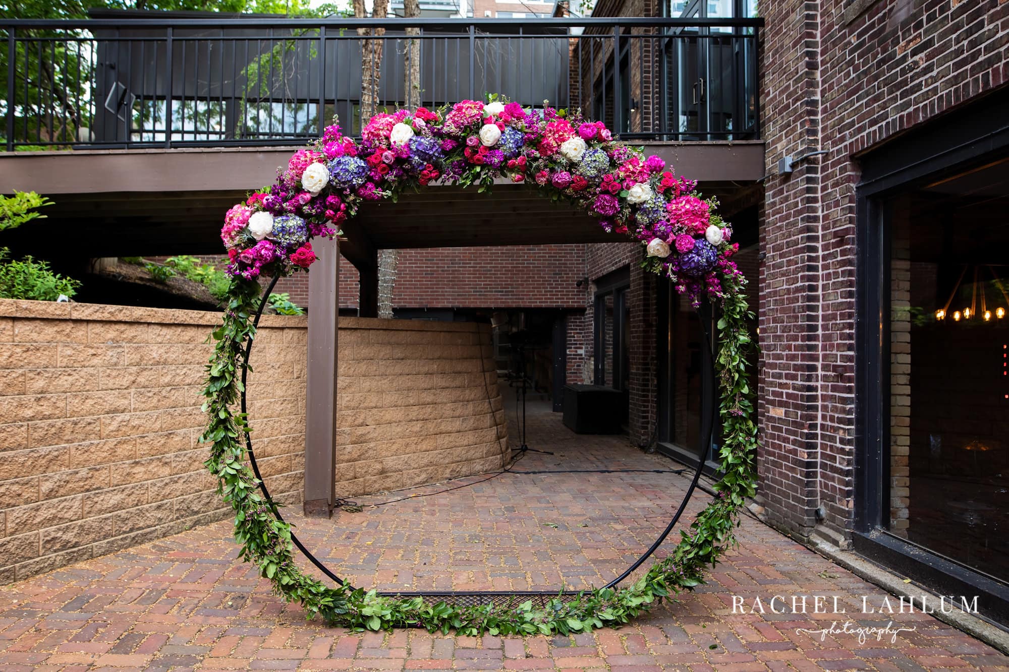 Archway decorated with flowers for wedding ceremony at The Minneapolis Event Center. 