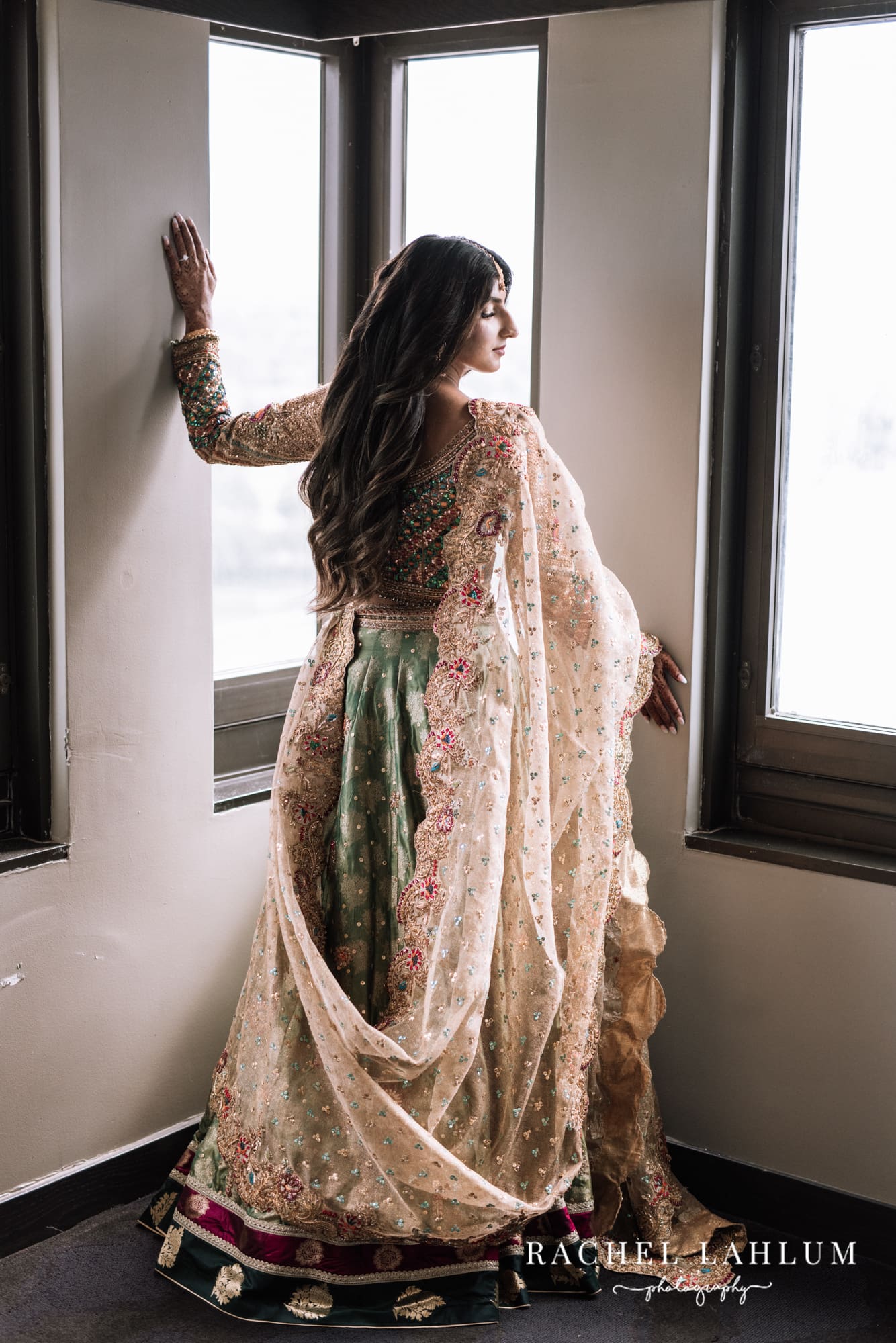 Bride shows off her dress before Walima celebration in St. Paul, MN