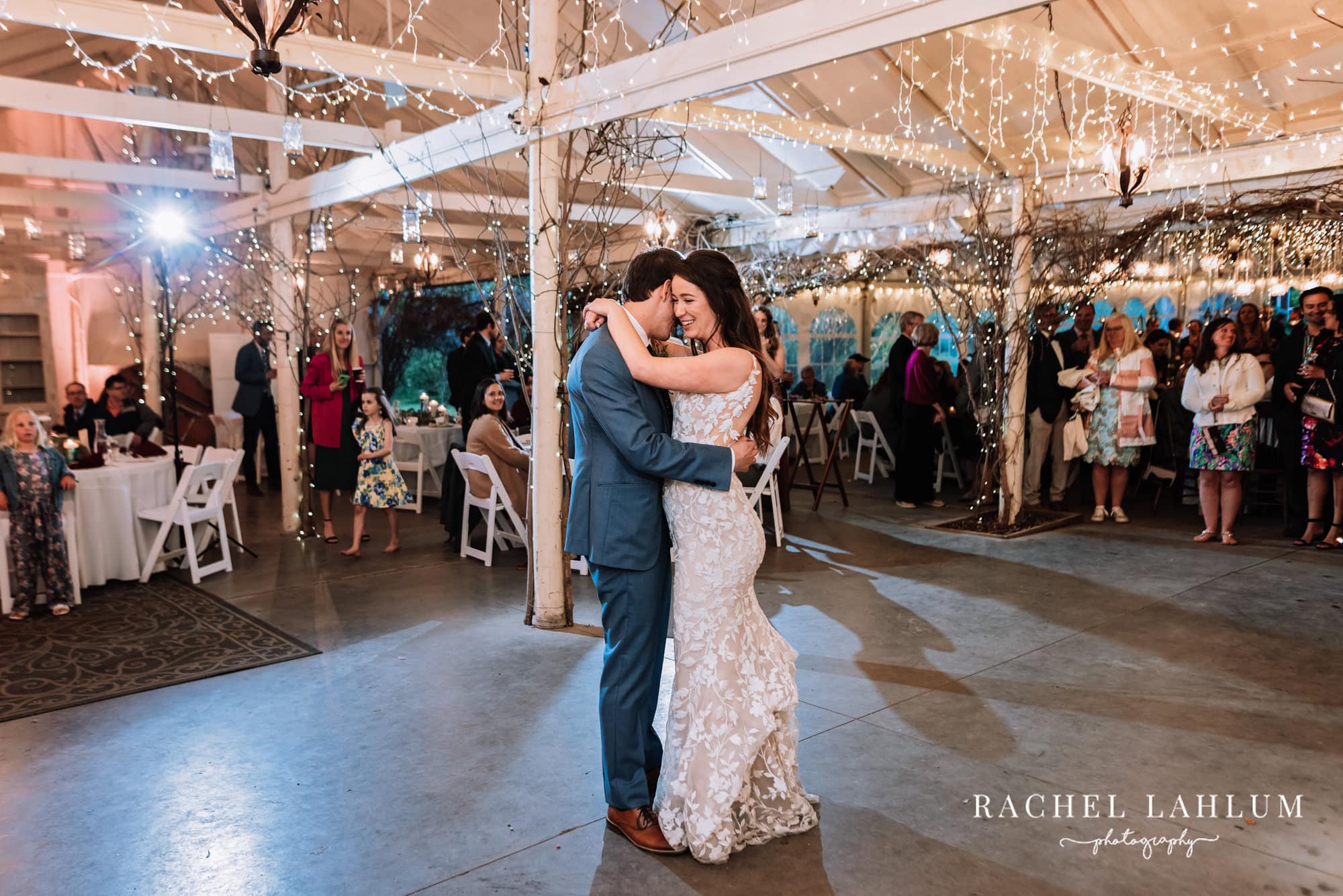Bride and groom share their first dance at Camrose Hill Flower Farm.
