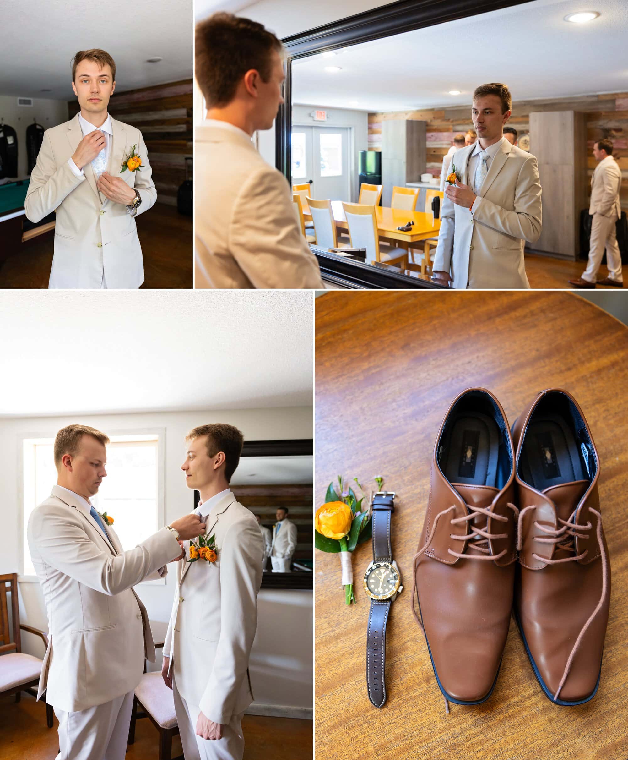 Groom adjusting his boutonniere in mirror shot during getting-ready preparations at the Cove Guest House BnB in Prescott, Wisconsin.