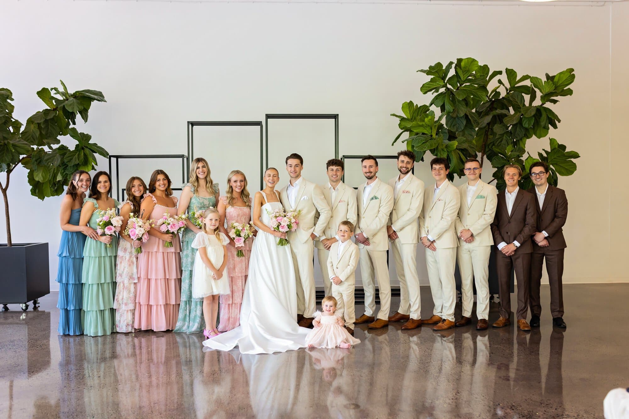 A full wedding party photo at a relaxed wedding at the Urban Daisy in Minneapolis, Minnesota