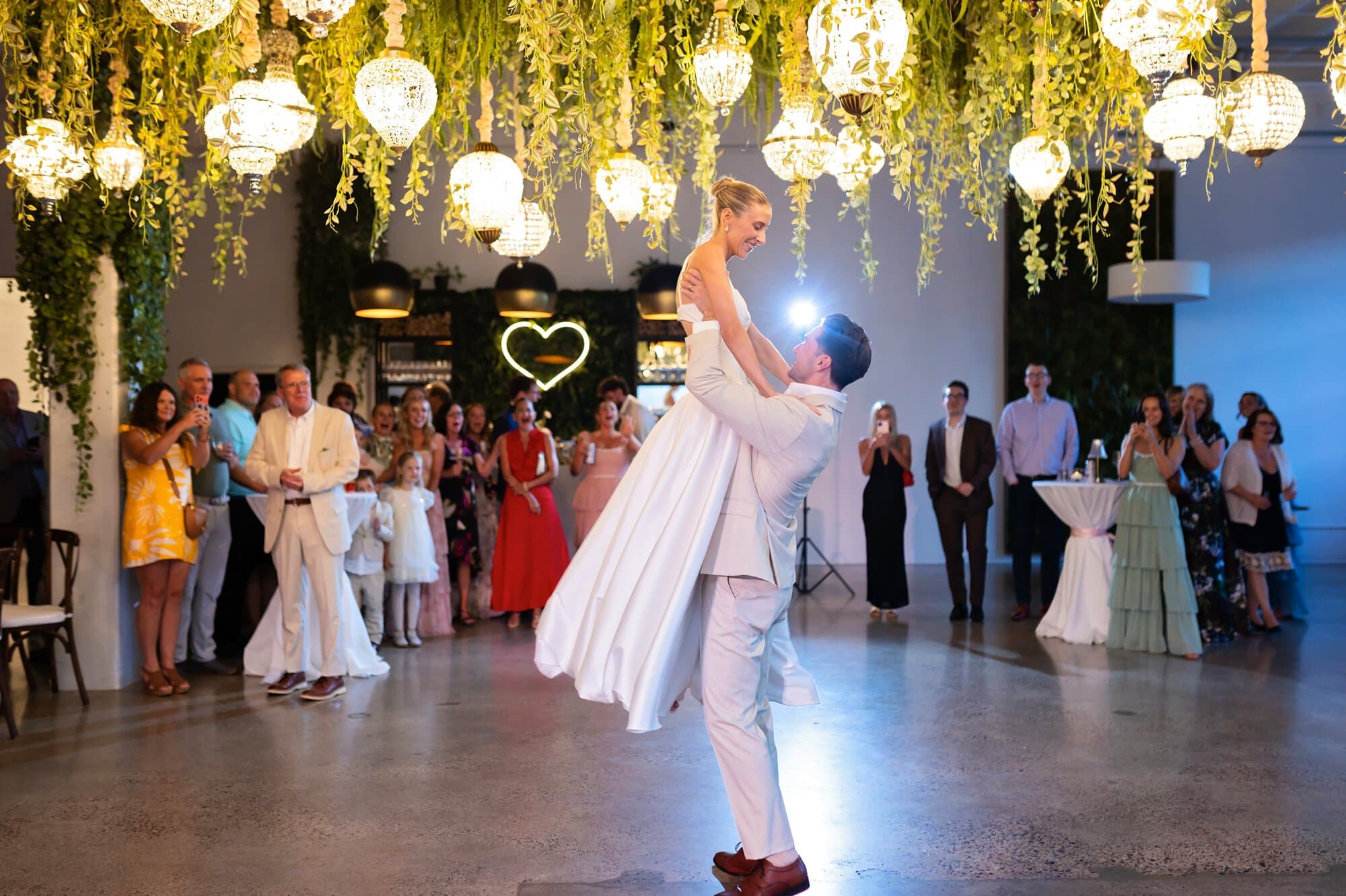Bride and groom having their first dance at a relaxed Urban Daisy wedding reception in Minneapolis, Minnesota