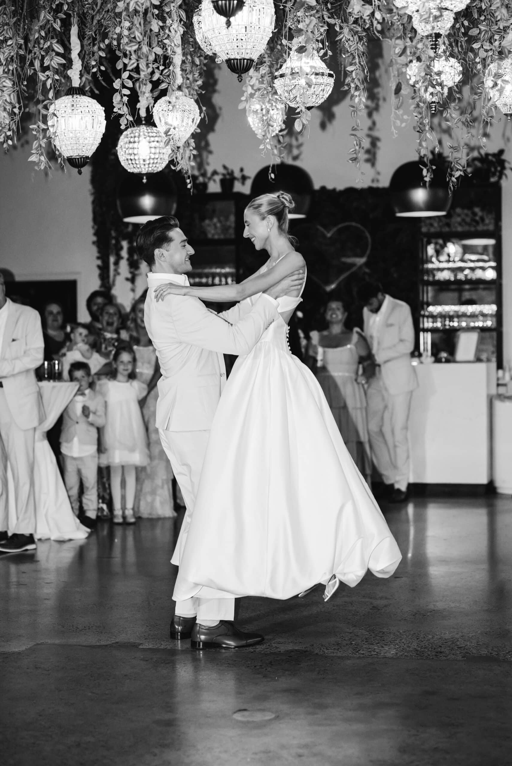 Bride and groom dancing at the reception of their relaxed Urban Daisy wedding in Minneapolis, Minnesota